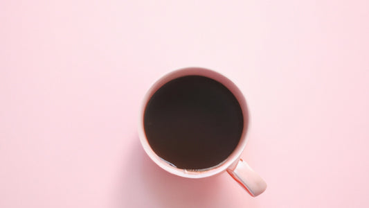 Coffee cup with pink background