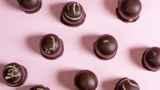 chocolate caffeine bon bons on a pink background