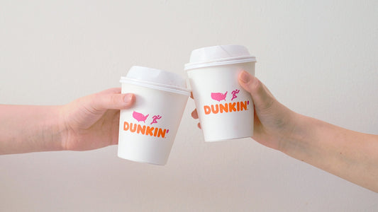 Dunkin Donuts Coffee Cups Held by Hands